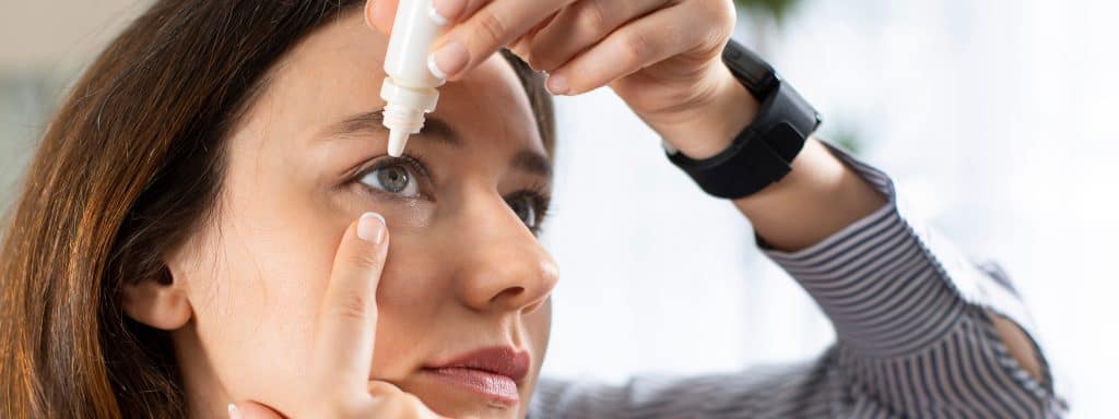 total optical - dry eye blog image drops woman